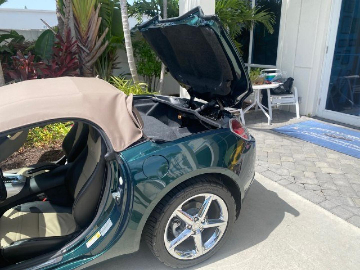 2008 Forest Green /Tan Saturn Sky AUTO TURBO Red Line LOW MILES 3,949 (1G8MG35X48Y) with an Turbocharged And Intercooled Ecotec 2.0L VVT DOHC 4-Cyl Aluminum Engine engine, Automatic transmission, located at 4701 North Dixie Hwy, Pompano Beach, FL, 33064, (954) 422-2889, 26.240938, -80.123474 - OUR WEBPAGE FLORIDACARS1.COM HAS OVER 100 PHOTOS AND FREE CARFAX LINK 2008 Saturn SKY Red Line Turbo All Original Paint Collectors Welcome Convertible 2.0L I4 F DOHC Gasoline 31 MPG Rear Wheel Drive Features ABS Brakes Air Conditioning Alloy Wheels AM/FM Stereo Automatic Transmission CD Audio Cruise- Photo#13