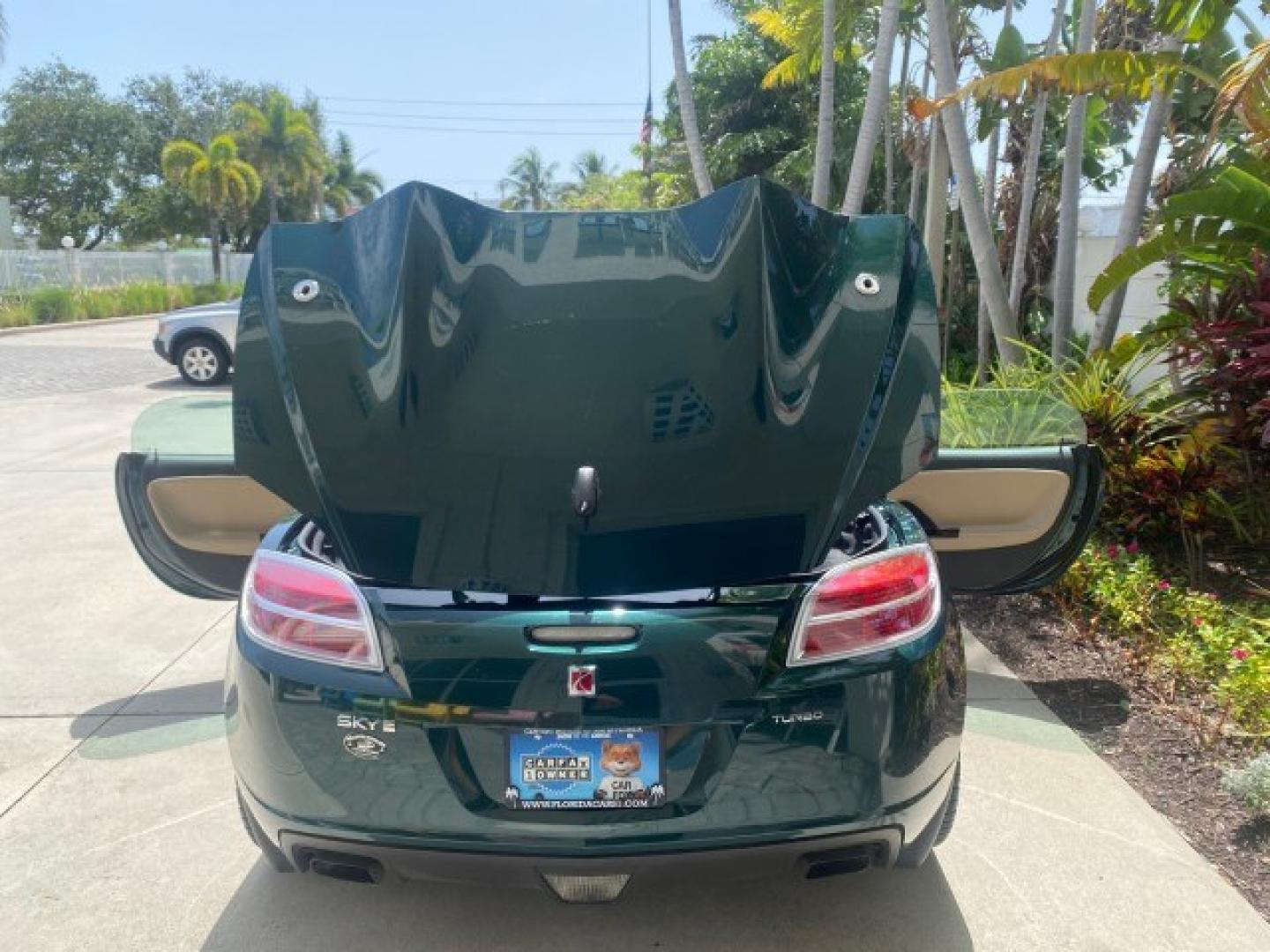 2008 Forest Green /Tan Saturn Sky AUTO TURBO Red Line LOW MILES 3,949 (1G8MG35X48Y) with an Turbocharged And Intercooled Ecotec 2.0L VVT DOHC 4-Cyl Aluminum Engine engine, Automatic transmission, located at 4701 North Dixie Hwy, Pompano Beach, FL, 33064, (954) 422-2889, 26.240938, -80.123474 - OUR WEBPAGE FLORIDACARS1.COM HAS OVER 100 PHOTOS AND FREE CARFAX LINK 2008 Saturn SKY Red Line Turbo All Original Paint Collectors Welcome Convertible 2.0L I4 F DOHC Gasoline 31 MPG Rear Wheel Drive Features ABS Brakes Air Conditioning Alloy Wheels AM/FM Stereo Automatic Transmission CD Audio Cruise- Photo#15