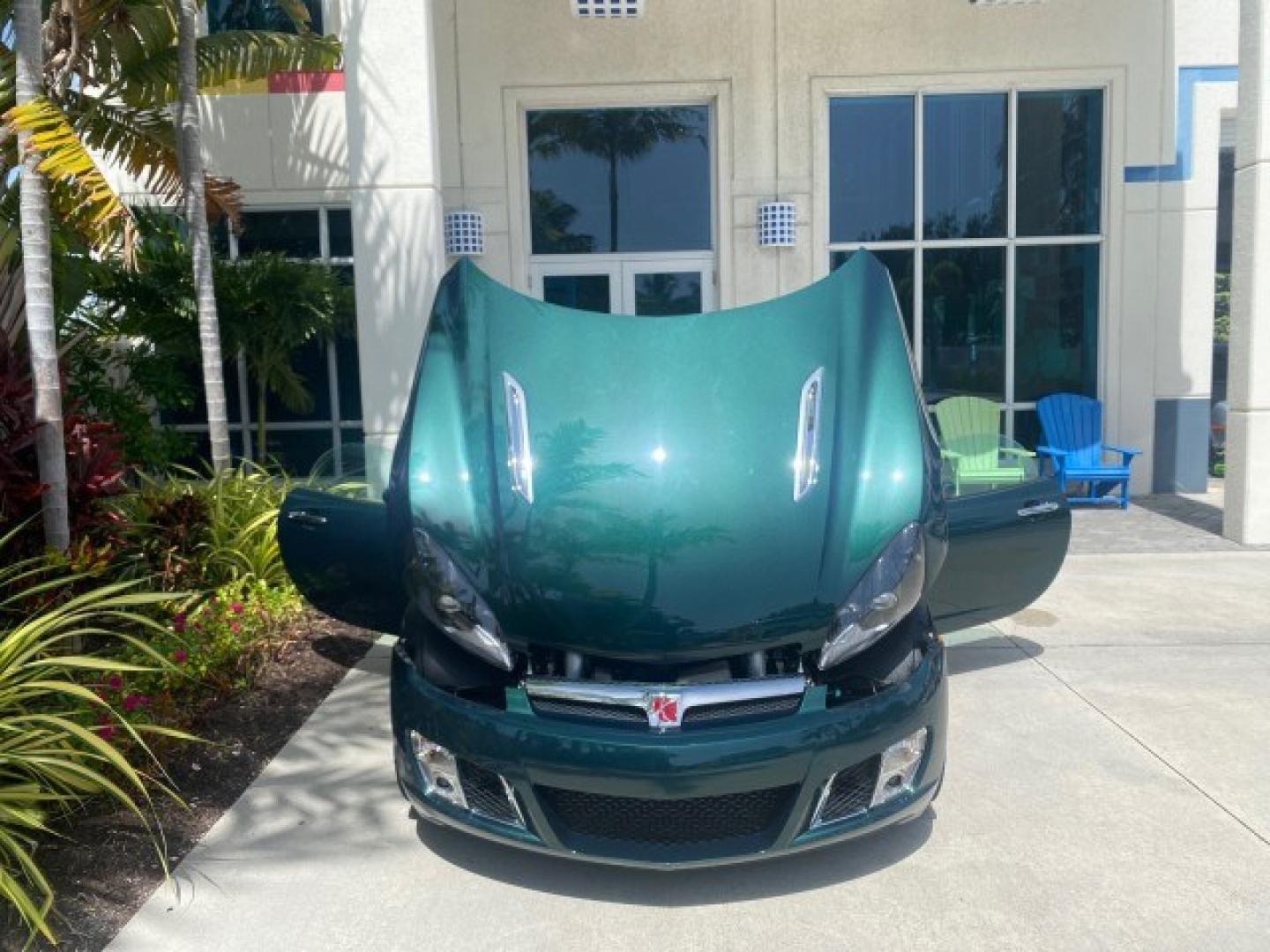 2008 Forest Green /Tan Saturn Sky AUTO TURBO Red Line LOW MILES 3,949 (1G8MG35X48Y) with an Turbocharged And Intercooled Ecotec 2.0L VVT DOHC 4-Cyl Aluminum Engine engine, Automatic transmission, located at 4701 North Dixie Hwy, Pompano Beach, FL, 33064, (954) 422-2889, 26.240938, -80.123474 - OUR WEBPAGE FLORIDACARS1.COM HAS OVER 100 PHOTOS AND FREE CARFAX LINK 2008 Saturn SKY Red Line Turbo All Original Paint Collectors Welcome Convertible 2.0L I4 F DOHC Gasoline 31 MPG Rear Wheel Drive Features ABS Brakes Air Conditioning Alloy Wheels AM/FM Stereo Automatic Transmission CD Audio Cruise- Photo#16