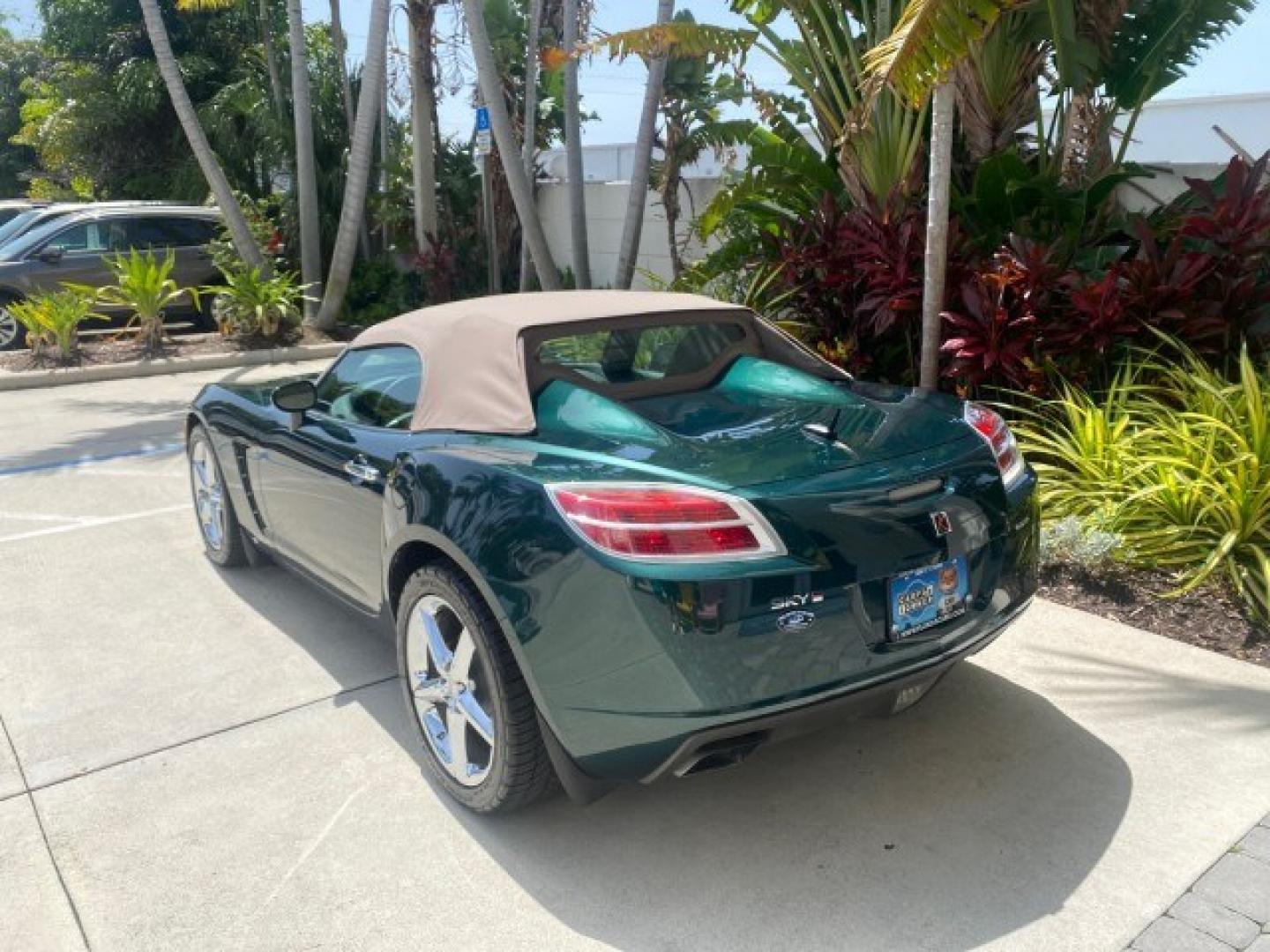 2008 Forest Green /Tan Saturn Sky AUTO TURBO Red Line LOW MILES 3,949 (1G8MG35X48Y) with an Turbocharged And Intercooled Ecotec 2.0L VVT DOHC 4-Cyl Aluminum Engine engine, Automatic transmission, located at 4701 North Dixie Hwy, Pompano Beach, FL, 33064, (954) 422-2889, 26.240938, -80.123474 - OUR WEBPAGE FLORIDACARS1.COM HAS OVER 100 PHOTOS AND FREE CARFAX LINK 2008 Saturn SKY Red Line Turbo All Original Paint Collectors Welcome Convertible 2.0L I4 F DOHC Gasoline 31 MPG Rear Wheel Drive Features ABS Brakes Air Conditioning Alloy Wheels AM/FM Stereo Automatic Transmission CD Audio Cruise- Photo#32