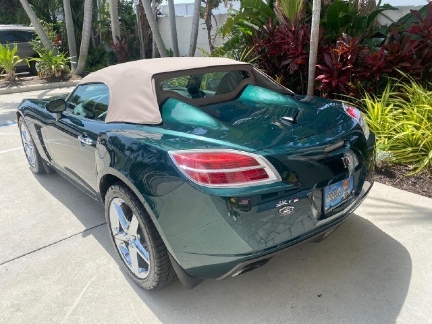 2008 Forest Green /Tan Saturn Sky AUTO TURBO Red Line LOW MILES 3,949 (1G8MG35X48Y) with an Turbocharged And Intercooled Ecotec 2.0L VVT DOHC 4-Cyl Aluminum Engine engine, Automatic transmission, located at 4701 North Dixie Hwy, Pompano Beach, FL, 33064, (954) 422-2889, 26.240938, -80.123474 - OUR WEBPAGE FLORIDACARS1.COM HAS OVER 100 PHOTOS AND FREE CARFAX LINK 2008 Saturn SKY Red Line Turbo All Original Paint Collectors Welcome Convertible 2.0L I4 F DOHC Gasoline 31 MPG Rear Wheel Drive Features ABS Brakes Air Conditioning Alloy Wheels AM/FM Stereo Automatic Transmission CD Audio Cruise- Photo#33