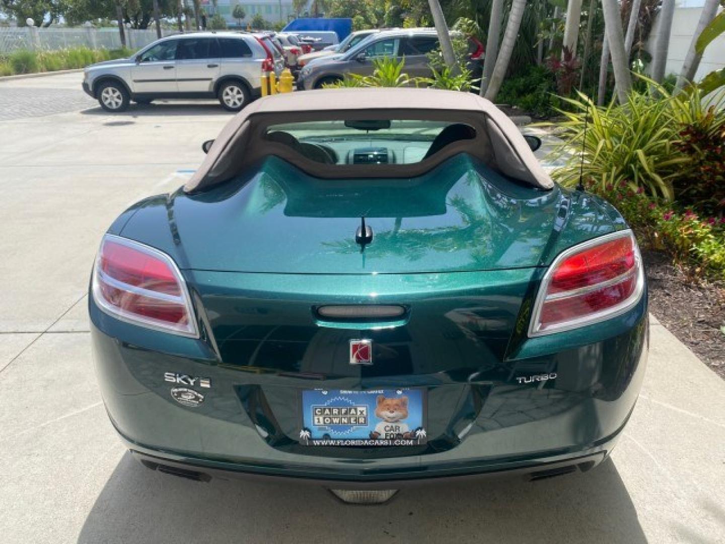 2008 Forest Green /Tan Saturn Sky AUTO TURBO Red Line LOW MILES 3,949 (1G8MG35X48Y) with an Turbocharged And Intercooled Ecotec 2.0L VVT DOHC 4-Cyl Aluminum Engine engine, Automatic transmission, located at 4701 North Dixie Hwy, Pompano Beach, FL, 33064, (954) 422-2889, 26.240938, -80.123474 - OUR WEBPAGE FLORIDACARS1.COM HAS OVER 100 PHOTOS AND FREE CARFAX LINK 2008 Saturn SKY Red Line Turbo All Original Paint Collectors Welcome Convertible 2.0L I4 F DOHC Gasoline 31 MPG Rear Wheel Drive Features ABS Brakes Air Conditioning Alloy Wheels AM/FM Stereo Automatic Transmission CD Audio Cruise- Photo#35