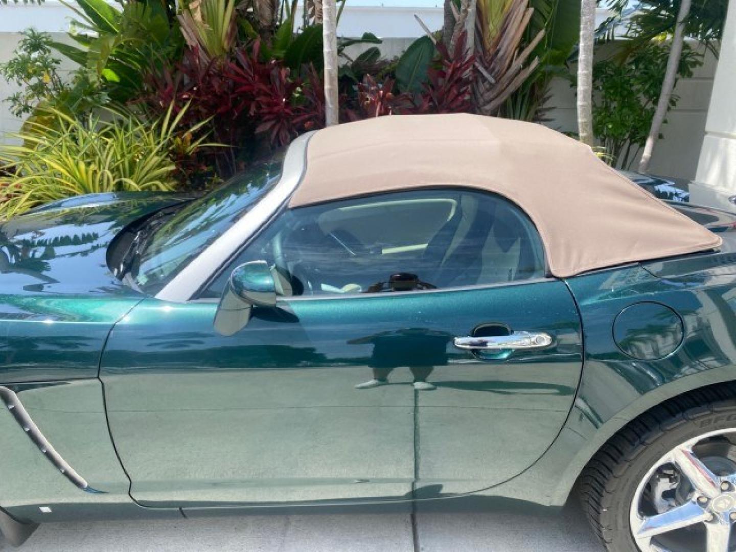2008 Forest Green /Tan Saturn Sky AUTO TURBO Red Line LOW MILES 3,949 (1G8MG35X48Y) with an Turbocharged And Intercooled Ecotec 2.0L VVT DOHC 4-Cyl Aluminum Engine engine, Automatic transmission, located at 4701 North Dixie Hwy, Pompano Beach, FL, 33064, (954) 422-2889, 26.240938, -80.123474 - OUR WEBPAGE FLORIDACARS1.COM HAS OVER 100 PHOTOS AND FREE CARFAX LINK 2008 Saturn SKY Red Line Turbo All Original Paint Collectors Welcome Convertible 2.0L I4 F DOHC Gasoline 31 MPG Rear Wheel Drive Features ABS Brakes Air Conditioning Alloy Wheels AM/FM Stereo Automatic Transmission CD Audio Cruise- Photo#36