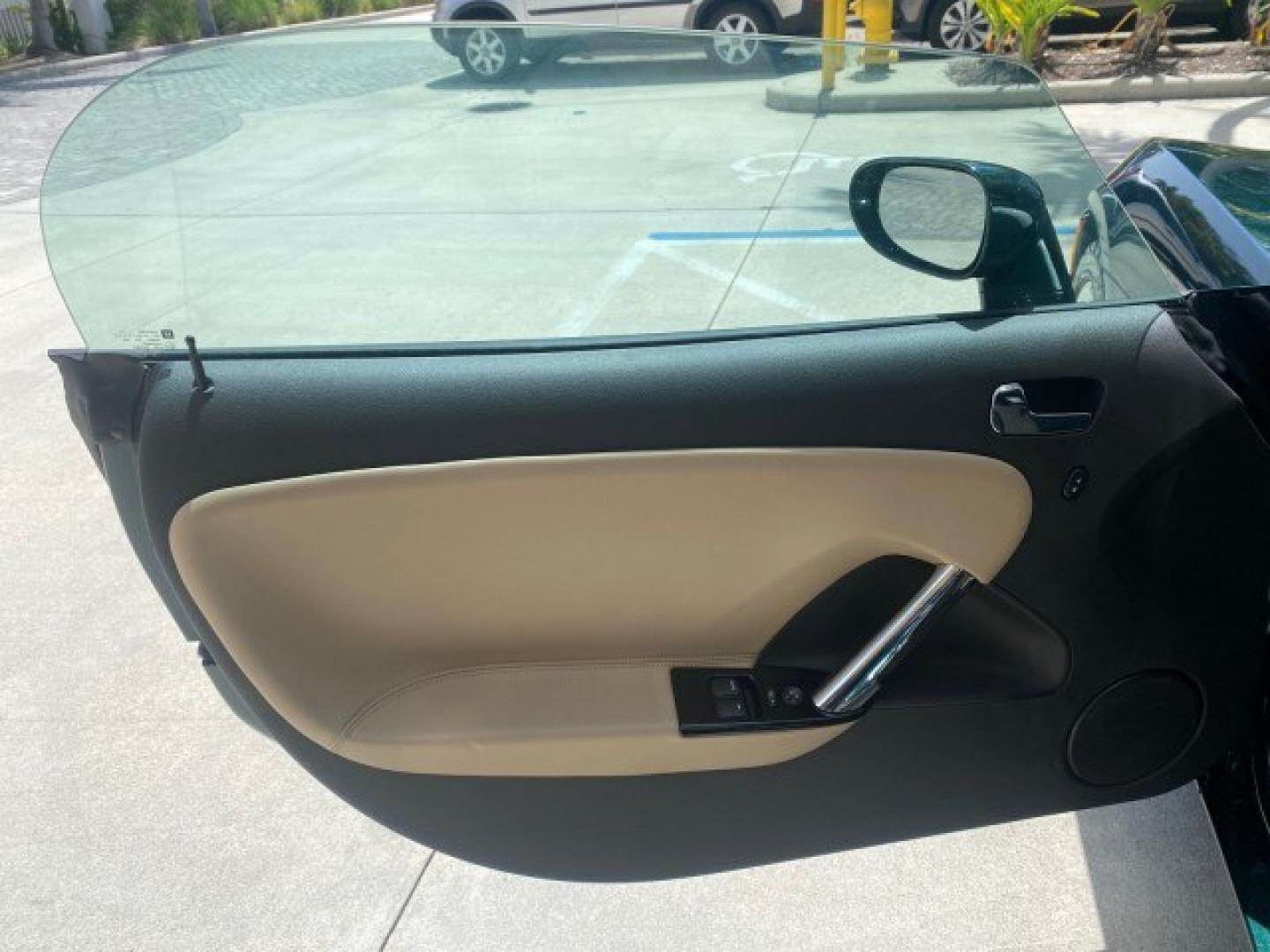 2008 Forest Green /Tan Saturn Sky AUTO TURBO Red Line LOW MILES 3,949 (1G8MG35X48Y) with an Turbocharged And Intercooled Ecotec 2.0L VVT DOHC 4-Cyl Aluminum Engine engine, Automatic transmission, located at 4701 North Dixie Hwy, Pompano Beach, FL, 33064, (954) 422-2889, 26.240938, -80.123474 - OUR WEBPAGE FLORIDACARS1.COM HAS OVER 100 PHOTOS AND FREE CARFAX LINK 2008 Saturn SKY Red Line Turbo All Original Paint Collectors Welcome Convertible 2.0L I4 F DOHC Gasoline 31 MPG Rear Wheel Drive Features ABS Brakes Air Conditioning Alloy Wheels AM/FM Stereo Automatic Transmission CD Audio Cruise- Photo#40
