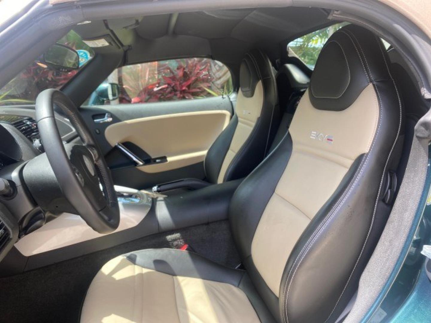 2008 Forest Green /Tan Saturn Sky AUTO TURBO Red Line LOW MILES 3,949 (1G8MG35X48Y) with an Turbocharged And Intercooled Ecotec 2.0L VVT DOHC 4-Cyl Aluminum Engine engine, Automatic transmission, located at 4701 North Dixie Hwy, Pompano Beach, FL, 33064, (954) 422-2889, 26.240938, -80.123474 - OUR WEBPAGE FLORIDACARS1.COM HAS OVER 100 PHOTOS AND FREE CARFAX LINK 2008 Saturn SKY Red Line Turbo All Original Paint Collectors Welcome Convertible 2.0L I4 F DOHC Gasoline 31 MPG Rear Wheel Drive Features ABS Brakes Air Conditioning Alloy Wheels AM/FM Stereo Automatic Transmission CD Audio Cruise- Photo#42