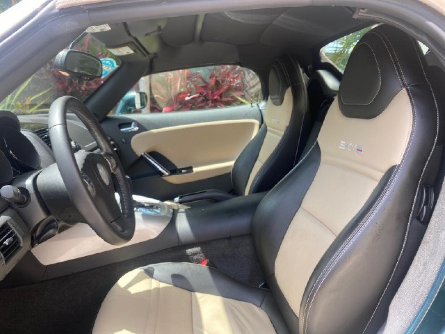 2008 Forest Green /Tan Saturn Sky AUTO TURBO Red Line LOW MILES 3,949 (1G8MG35X48Y) with an Turbocharged And Intercooled Ecotec 2.0L VVT DOHC 4-Cyl Aluminum Engine engine, Automatic transmission, located at 4701 North Dixie Hwy, Pompano Beach, FL, 33064, (954) 422-2889, 26.240938, -80.123474 - OUR WEBPAGE FLORIDACARS1.COM HAS OVER 100 PHOTOS AND FREE CARFAX LINK 2008 Saturn SKY Red Line Turbo All Original Paint Collectors Welcome Convertible 2.0L I4 F DOHC Gasoline 31 MPG Rear Wheel Drive Features ABS Brakes Air Conditioning Alloy Wheels AM/FM Stereo Automatic Transmission CD Audio Cruise- Photo#43
