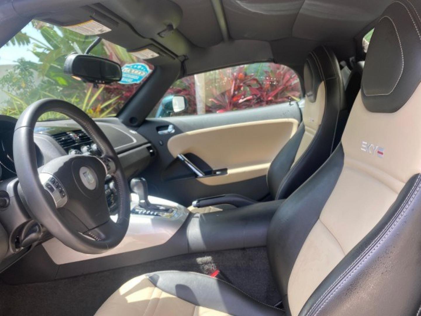 2008 Forest Green /Tan Saturn Sky AUTO TURBO Red Line LOW MILES 3,949 (1G8MG35X48Y) with an Turbocharged And Intercooled Ecotec 2.0L VVT DOHC 4-Cyl Aluminum Engine engine, Automatic transmission, located at 4701 North Dixie Hwy, Pompano Beach, FL, 33064, (954) 422-2889, 26.240938, -80.123474 - OUR WEBPAGE FLORIDACARS1.COM HAS OVER 100 PHOTOS AND FREE CARFAX LINK 2008 Saturn SKY Red Line Turbo All Original Paint Collectors Welcome Convertible 2.0L I4 F DOHC Gasoline 31 MPG Rear Wheel Drive Features ABS Brakes Air Conditioning Alloy Wheels AM/FM Stereo Automatic Transmission CD Audio Cruise- Photo#45