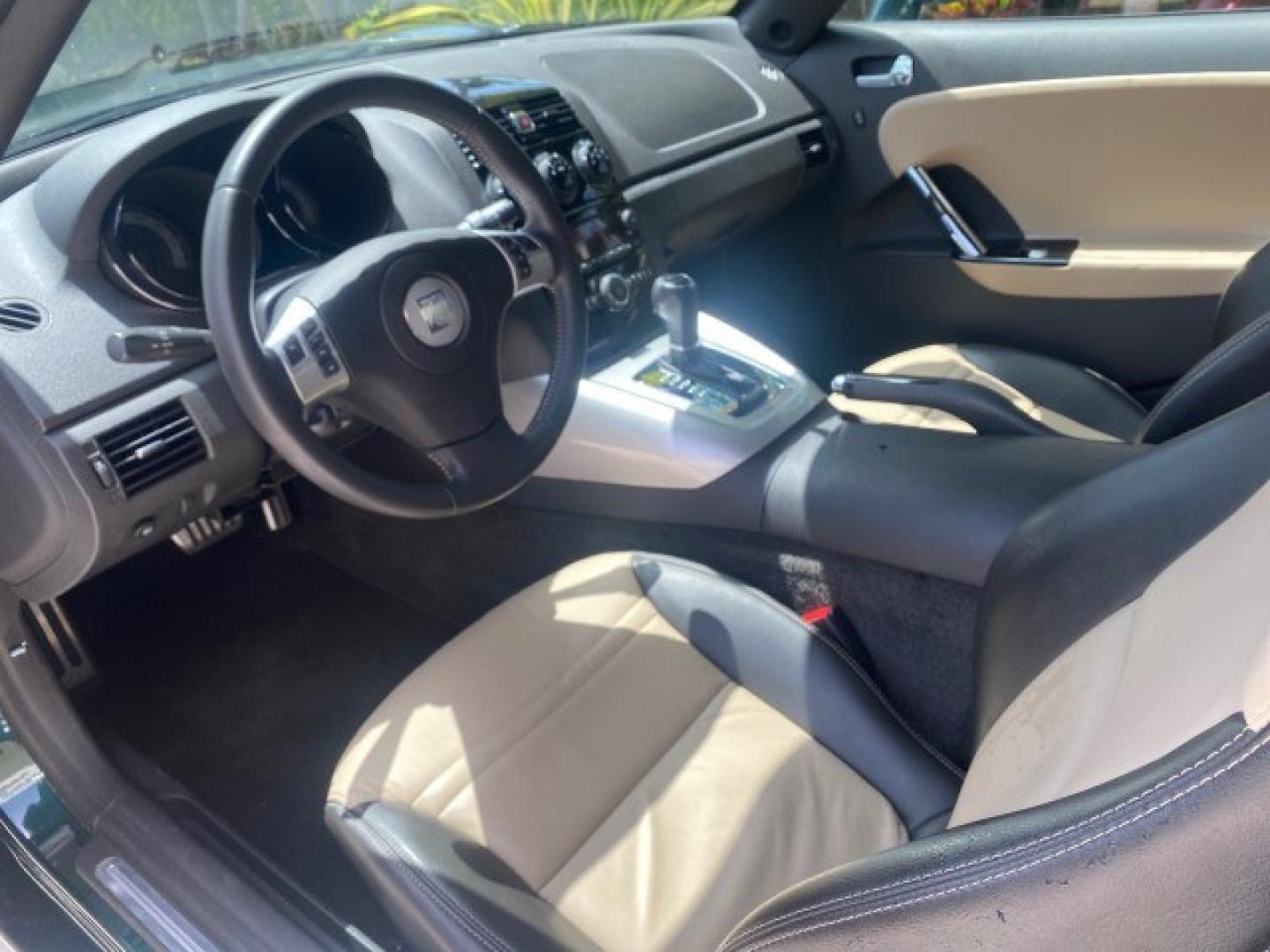 2008 Forest Green /Tan Saturn Sky AUTO TURBO Red Line LOW MILES 3,949 (1G8MG35X48Y) with an Turbocharged And Intercooled Ecotec 2.0L VVT DOHC 4-Cyl Aluminum Engine engine, Automatic transmission, located at 4701 North Dixie Hwy, Pompano Beach, FL, 33064, (954) 422-2889, 26.240938, -80.123474 - OUR WEBPAGE FLORIDACARS1.COM HAS OVER 100 PHOTOS AND FREE CARFAX LINK 2008 Saturn SKY Red Line Turbo All Original Paint Collectors Welcome Convertible 2.0L I4 F DOHC Gasoline 31 MPG Rear Wheel Drive Features ABS Brakes Air Conditioning Alloy Wheels AM/FM Stereo Automatic Transmission CD Audio Cruise- Photo#46