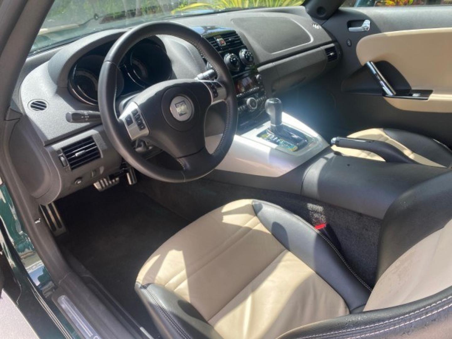 2008 Forest Green /Tan Saturn Sky AUTO TURBO Red Line LOW MILES 3,949 (1G8MG35X48Y) with an Turbocharged And Intercooled Ecotec 2.0L VVT DOHC 4-Cyl Aluminum Engine engine, Automatic transmission, located at 4701 North Dixie Hwy, Pompano Beach, FL, 33064, (954) 422-2889, 26.240938, -80.123474 - OUR WEBPAGE FLORIDACARS1.COM HAS OVER 100 PHOTOS AND FREE CARFAX LINK 2008 Saturn SKY Red Line Turbo All Original Paint Collectors Welcome Convertible 2.0L I4 F DOHC Gasoline 31 MPG Rear Wheel Drive Features ABS Brakes Air Conditioning Alloy Wheels AM/FM Stereo Automatic Transmission CD Audio Cruise- Photo#47