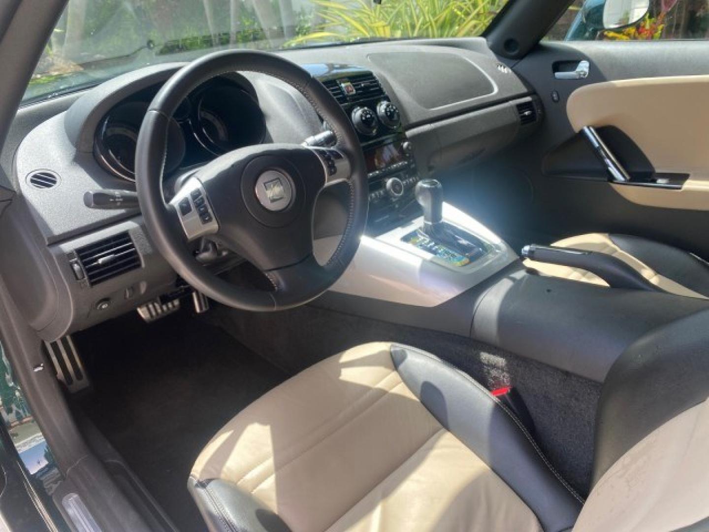 2008 Forest Green /Tan Saturn Sky AUTO TURBO Red Line LOW MILES 3,949 (1G8MG35X48Y) with an Turbocharged And Intercooled Ecotec 2.0L VVT DOHC 4-Cyl Aluminum Engine engine, Automatic transmission, located at 4701 North Dixie Hwy, Pompano Beach, FL, 33064, (954) 422-2889, 26.240938, -80.123474 - OUR WEBPAGE FLORIDACARS1.COM HAS OVER 100 PHOTOS AND FREE CARFAX LINK 2008 Saturn SKY Red Line Turbo All Original Paint Collectors Welcome Convertible 2.0L I4 F DOHC Gasoline 31 MPG Rear Wheel Drive Features ABS Brakes Air Conditioning Alloy Wheels AM/FM Stereo Automatic Transmission CD Audio Cruise- Photo#48