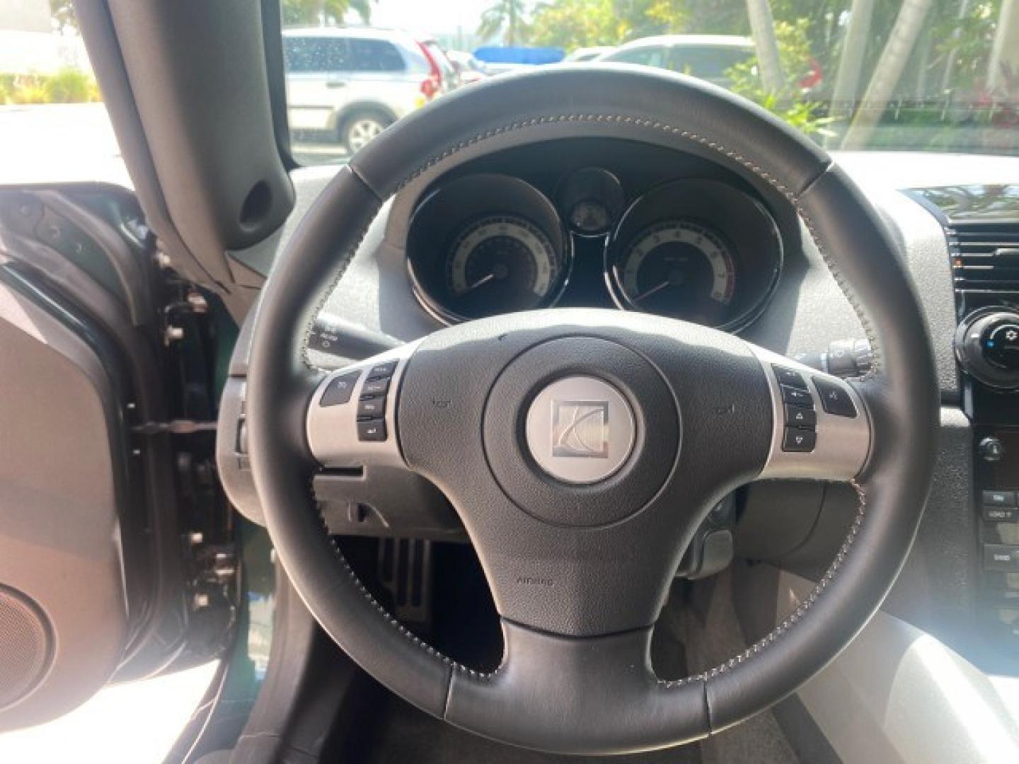 2008 Forest Green /Tan Saturn Sky AUTO TURBO Red Line LOW MILES 3,949 (1G8MG35X48Y) with an Turbocharged And Intercooled Ecotec 2.0L VVT DOHC 4-Cyl Aluminum Engine engine, Automatic transmission, located at 4701 North Dixie Hwy, Pompano Beach, FL, 33064, (954) 422-2889, 26.240938, -80.123474 - OUR WEBPAGE FLORIDACARS1.COM HAS OVER 100 PHOTOS AND FREE CARFAX LINK 2008 Saturn SKY Red Line Turbo All Original Paint Collectors Welcome Convertible 2.0L I4 F DOHC Gasoline 31 MPG Rear Wheel Drive Features ABS Brakes Air Conditioning Alloy Wheels AM/FM Stereo Automatic Transmission CD Audio Cruise- Photo#49