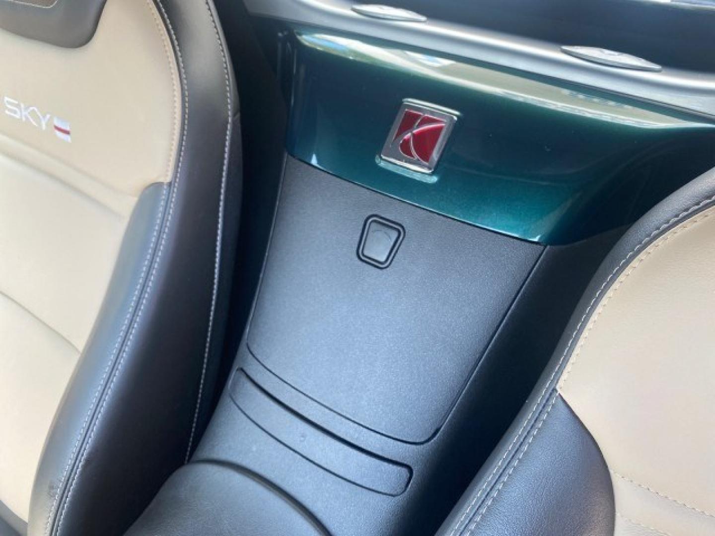2008 Forest Green /Tan Saturn Sky AUTO TURBO Red Line LOW MILES 3,949 (1G8MG35X48Y) with an Turbocharged And Intercooled Ecotec 2.0L VVT DOHC 4-Cyl Aluminum Engine engine, Automatic transmission, located at 4701 North Dixie Hwy, Pompano Beach, FL, 33064, (954) 422-2889, 26.240938, -80.123474 - OUR WEBPAGE FLORIDACARS1.COM HAS OVER 100 PHOTOS AND FREE CARFAX LINK 2008 Saturn SKY Red Line Turbo All Original Paint Collectors Welcome Convertible 2.0L I4 F DOHC Gasoline 31 MPG Rear Wheel Drive Features ABS Brakes Air Conditioning Alloy Wheels AM/FM Stereo Automatic Transmission CD Audio Cruise- Photo#60