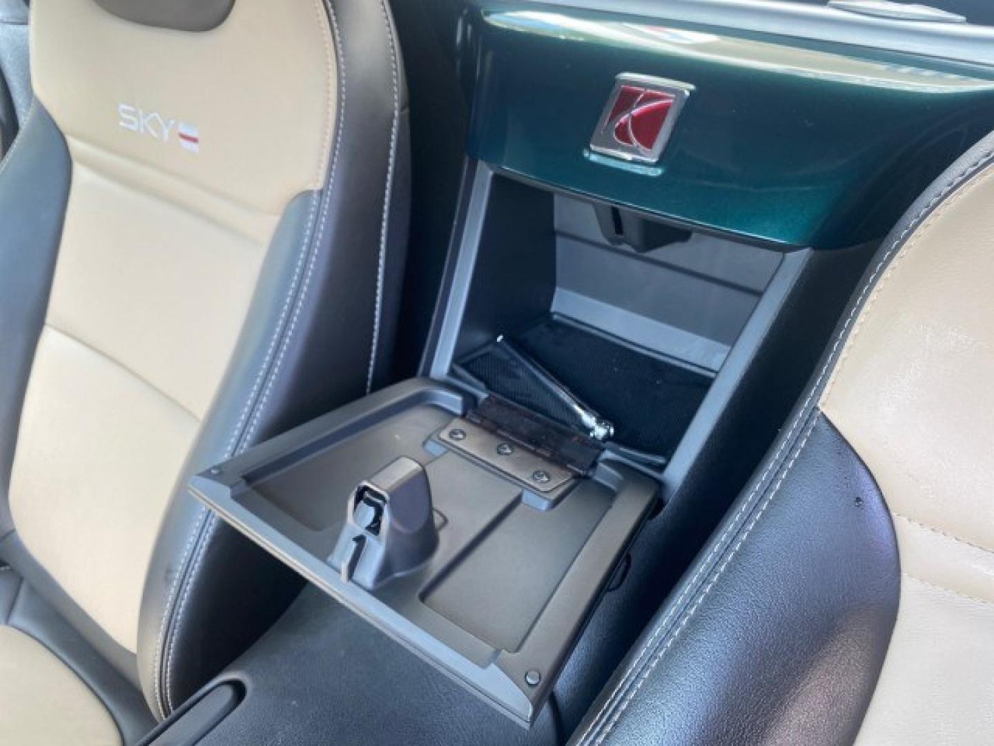 2008 Forest Green /Tan Saturn Sky AUTO TURBO Red Line LOW MILES 3,949 (1G8MG35X48Y) with an Turbocharged And Intercooled Ecotec 2.0L VVT DOHC 4-Cyl Aluminum Engine engine, Automatic transmission, located at 4701 North Dixie Hwy, Pompano Beach, FL, 33064, (954) 422-2889, 26.240938, -80.123474 - OUR WEBPAGE FLORIDACARS1.COM HAS OVER 100 PHOTOS AND FREE CARFAX LINK 2008 Saturn SKY Red Line Turbo All Original Paint Collectors Welcome Convertible 2.0L I4 F DOHC Gasoline 31 MPG Rear Wheel Drive Features ABS Brakes Air Conditioning Alloy Wheels AM/FM Stereo Automatic Transmission CD Audio Cruise- Photo#61