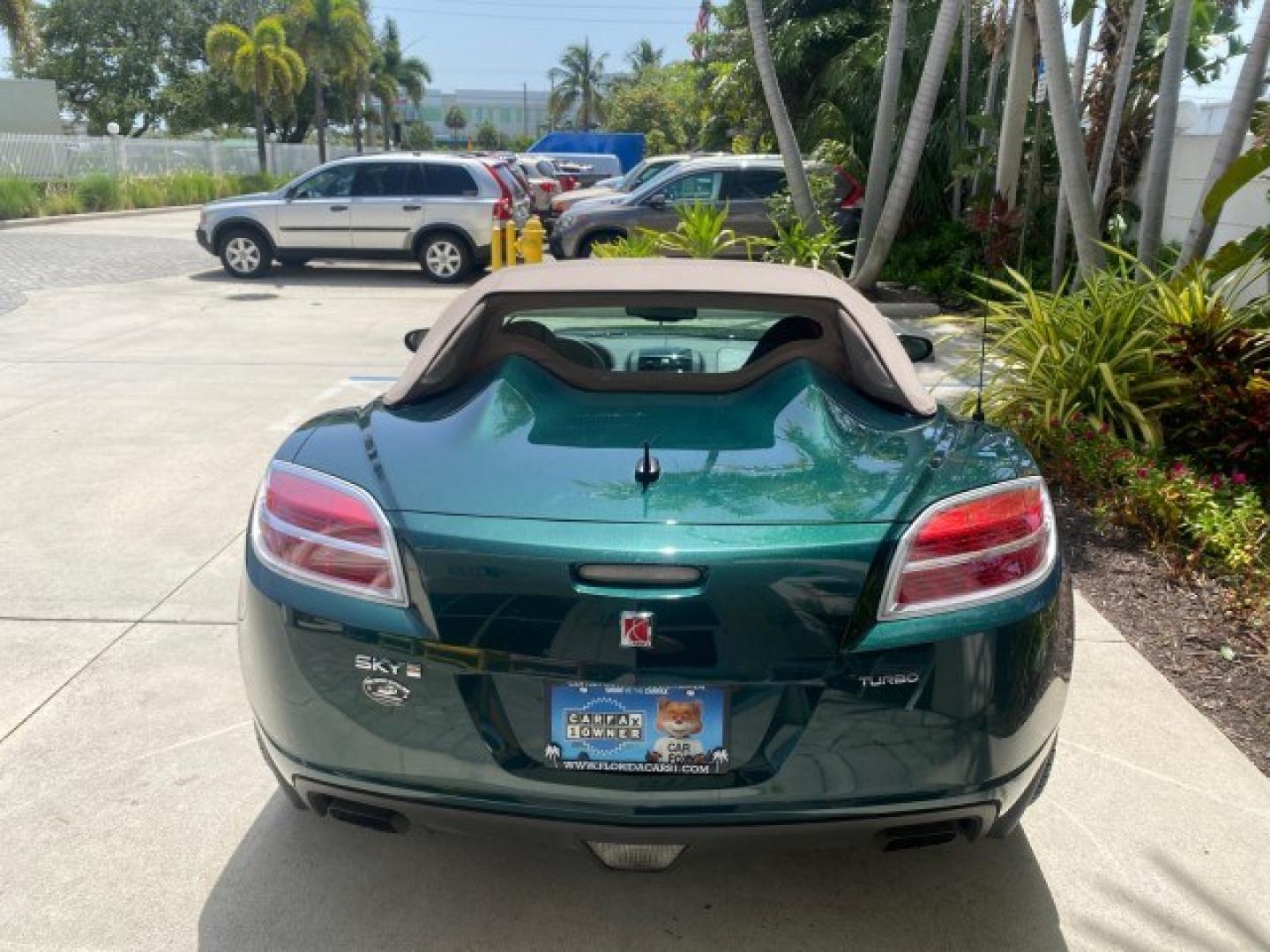 2008 Forest Green /Tan Saturn Sky AUTO TURBO Red Line LOW MILES 3,949 (1G8MG35X48Y) with an Turbocharged And Intercooled Ecotec 2.0L VVT DOHC 4-Cyl Aluminum Engine engine, Automatic transmission, located at 4701 North Dixie Hwy, Pompano Beach, FL, 33064, (954) 422-2889, 26.240938, -80.123474 - OUR WEBPAGE FLORIDACARS1.COM HAS OVER 100 PHOTOS AND FREE CARFAX LINK 2008 Saturn SKY Red Line Turbo All Original Paint Collectors Welcome Convertible 2.0L I4 F DOHC Gasoline 31 MPG Rear Wheel Drive Features ABS Brakes Air Conditioning Alloy Wheels AM/FM Stereo Automatic Transmission CD Audio Cruise- Photo#75