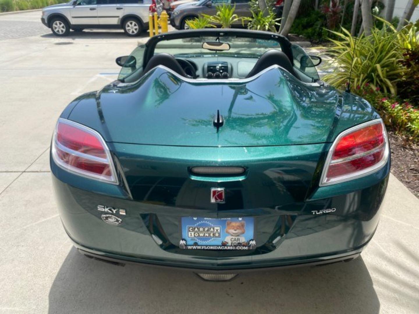 2008 Forest Green /Tan Saturn Sky AUTO TURBO Red Line LOW MILES 3,949 (1G8MG35X48Y) with an Turbocharged And Intercooled Ecotec 2.0L VVT DOHC 4-Cyl Aluminum Engine engine, Automatic transmission, located at 4701 North Dixie Hwy, Pompano Beach, FL, 33064, (954) 422-2889, 26.240938, -80.123474 - OUR WEBPAGE FLORIDACARS1.COM HAS OVER 100 PHOTOS AND FREE CARFAX LINK 2008 Saturn SKY Red Line Turbo All Original Paint Collectors Welcome Convertible 2.0L I4 F DOHC Gasoline 31 MPG Rear Wheel Drive Features ABS Brakes Air Conditioning Alloy Wheels AM/FM Stereo Automatic Transmission CD Audio Cruise- Photo#94