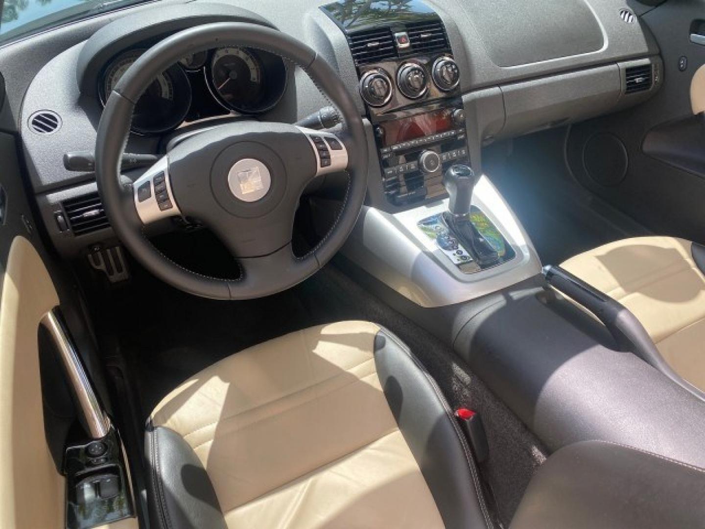 2008 Forest Green /Tan Saturn Sky AUTO TURBO Red Line LOW MILES 3,949 (1G8MG35X48Y) with an Turbocharged And Intercooled Ecotec 2.0L VVT DOHC 4-Cyl Aluminum Engine engine, Automatic transmission, located at 4701 North Dixie Hwy, Pompano Beach, FL, 33064, (954) 422-2889, 26.240938, -80.123474 - OUR WEBPAGE FLORIDACARS1.COM HAS OVER 100 PHOTOS AND FREE CARFAX LINK 2008 Saturn SKY Red Line Turbo All Original Paint Collectors Welcome Convertible 2.0L I4 F DOHC Gasoline 31 MPG Rear Wheel Drive Features ABS Brakes Air Conditioning Alloy Wheels AM/FM Stereo Automatic Transmission CD Audio Cruise- Photo#96