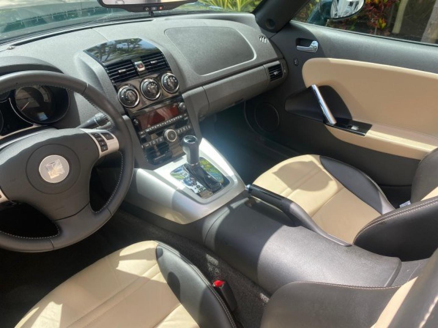 2008 Forest Green /Tan Saturn Sky AUTO TURBO Red Line LOW MILES 3,949 (1G8MG35X48Y) with an Turbocharged And Intercooled Ecotec 2.0L VVT DOHC 4-Cyl Aluminum Engine engine, Automatic transmission, located at 4701 North Dixie Hwy, Pompano Beach, FL, 33064, (954) 422-2889, 26.240938, -80.123474 - OUR WEBPAGE FLORIDACARS1.COM HAS OVER 100 PHOTOS AND FREE CARFAX LINK 2008 Saturn SKY Red Line Turbo All Original Paint Collectors Welcome Convertible 2.0L I4 F DOHC Gasoline 31 MPG Rear Wheel Drive Features ABS Brakes Air Conditioning Alloy Wheels AM/FM Stereo Automatic Transmission CD Audio Cruise- Photo#97