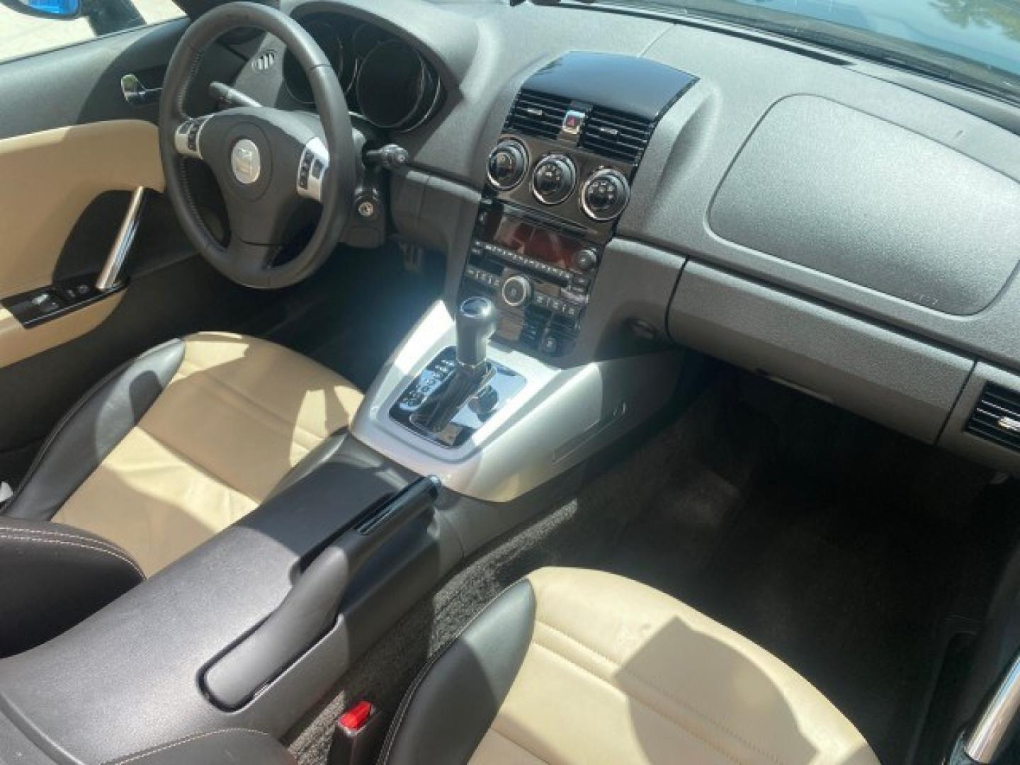 2008 Forest Green /Tan Saturn Sky AUTO TURBO Red Line LOW MILES 3,949 (1G8MG35X48Y) with an Turbocharged And Intercooled Ecotec 2.0L VVT DOHC 4-Cyl Aluminum Engine engine, Automatic transmission, located at 4701 North Dixie Hwy, Pompano Beach, FL, 33064, (954) 422-2889, 26.240938, -80.123474 - OUR WEBPAGE FLORIDACARS1.COM HAS OVER 100 PHOTOS AND FREE CARFAX LINK 2008 Saturn SKY Red Line Turbo All Original Paint Collectors Welcome Convertible 2.0L I4 F DOHC Gasoline 31 MPG Rear Wheel Drive Features ABS Brakes Air Conditioning Alloy Wheels AM/FM Stereo Automatic Transmission CD Audio Cruise- Photo#98