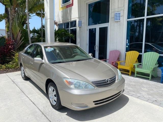 2004 Desert Sand Mica /Stone Toyota Camry LE LOW MILES 58,925 1 OWNER (4T1BE32K04U) with an 2.4L DOHC MPFI Vvti 16-Valve 4-Cyl Engine engine, Automatic transmission, located at 4701 North Dixie Hwy, Pompano Beach, FL, 33064, (954) 422-2889, 26.240938, -80.123474 - OUR WEBPAGE FLORIDACARS1.COM HAS OVER 100 PHOTOS AND FREE CARFAX LINK 2004 Toyota Camry LE 1 OWNER Sedan 4 DR 2.4L I4 F DOHC 16V Gasoline 32 MPG Front Wheel Drive Features Air Conditioning AM/FM Stereo Automatic Transmission Cassette Player CD Audio Cloth Seats Cruise Control Power Locks Power Mirro- Photo#1