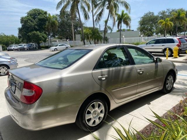 2004 Desert Sand Mica /Stone Toyota Camry LE LOW MILES 58,925 1 OWNER (4T1BE32K04U) with an 2.4L DOHC MPFI Vvti 16-Valve 4-Cyl Engine engine, Automatic transmission, located at 4701 North Dixie Hwy, Pompano Beach, FL, 33064, (954) 422-2889, 26.240938, -80.123474 - OUR WEBPAGE FLORIDACARS1.COM HAS OVER 100 PHOTOS AND FREE CARFAX LINK 2004 Toyota Camry LE 1 OWNER Sedan 4 DR 2.4L I4 F DOHC 16V Gasoline 32 MPG Front Wheel Drive Features Air Conditioning AM/FM Stereo Automatic Transmission Cassette Player CD Audio Cloth Seats Cruise Control Power Locks Power Mirro- Photo#7