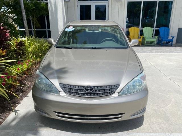 2004 Desert Sand Mica /Stone Toyota Camry LE LOW MILES 58,925 1 OWNER (4T1BE32K04U) with an 2.4L DOHC MPFI Vvti 16-Valve 4-Cyl Engine engine, Automatic transmission, located at 4701 North Dixie Hwy, Pompano Beach, FL, 33064, (954) 422-2889, 26.240938, -80.123474 - OUR WEBPAGE FLORIDACARS1.COM HAS OVER 100 PHOTOS AND FREE CARFAX LINK 2004 Toyota Camry LE 1 OWNER Sedan 4 DR 2.4L I4 F DOHC 16V Gasoline 32 MPG Front Wheel Drive Features Air Conditioning AM/FM Stereo Automatic Transmission Cassette Player CD Audio Cloth Seats Cruise Control Power Locks Power Mirro- Photo#27