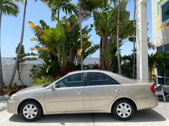 2004 Desert Sand Mica /Stone Toyota Camry LE LOW MILES 58,925 1 OWNER (4T1BE32K04U) with an 2.4L DOHC MPFI Vvti 16-Valve 4-Cyl Engine engine, Automatic transmission, located at 4701 North Dixie Hwy, Pompano Beach, FL, 33064, (954) 422-2889, 26.240938, -80.123474 - OUR WEBPAGE FLORIDACARS1.COM HAS OVER 100 PHOTOS AND FREE CARFAX LINK 2004 Toyota Camry LE 1 OWNER Sedan 4 DR 2.4L I4 F DOHC 16V Gasoline 32 MPG Front Wheel Drive Features Air Conditioning AM/FM Stereo Automatic Transmission Cassette Player CD Audio Cloth Seats Cruise Control Power Locks Power Mirro- Photo#31