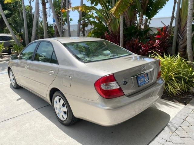 2004 Desert Sand Mica /Stone Toyota Camry LE LOW MILES 58,925 1 OWNER (4T1BE32K04U) with an 2.4L DOHC MPFI Vvti 16-Valve 4-Cyl Engine engine, Automatic transmission, located at 4701 North Dixie Hwy, Pompano Beach, FL, 33064, (954) 422-2889, 26.240938, -80.123474 - OUR WEBPAGE FLORIDACARS1.COM HAS OVER 100 PHOTOS AND FREE CARFAX LINK 2004 Toyota Camry LE 1 OWNER Sedan 4 DR 2.4L I4 F DOHC 16V Gasoline 32 MPG Front Wheel Drive Features Air Conditioning AM/FM Stereo Automatic Transmission Cassette Player CD Audio Cloth Seats Cruise Control Power Locks Power Mirro- Photo#33