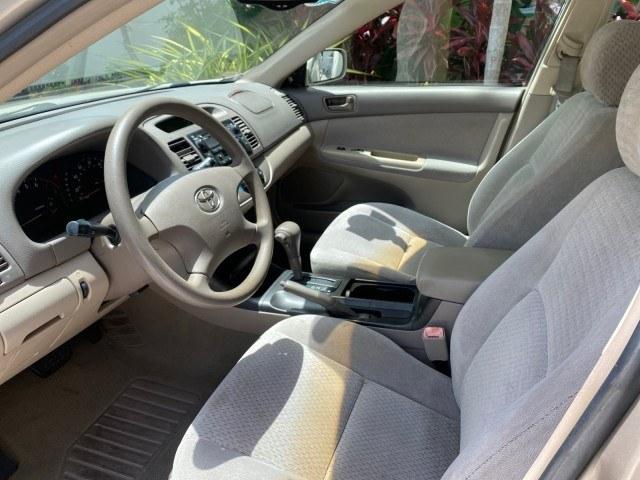 2004 Desert Sand Mica /Stone Toyota Camry LE LOW MILES 58,925 1 OWNER (4T1BE32K04U) with an 2.4L DOHC MPFI Vvti 16-Valve 4-Cyl Engine engine, Automatic transmission, located at 4701 North Dixie Hwy, Pompano Beach, FL, 33064, (954) 422-2889, 26.240938, -80.123474 - OUR WEBPAGE FLORIDACARS1.COM HAS OVER 100 PHOTOS AND FREE CARFAX LINK 2004 Toyota Camry LE 1 OWNER Sedan 4 DR 2.4L I4 F DOHC 16V Gasoline 32 MPG Front Wheel Drive Features Air Conditioning AM/FM Stereo Automatic Transmission Cassette Player CD Audio Cloth Seats Cruise Control Power Locks Power Mirro- Photo#43