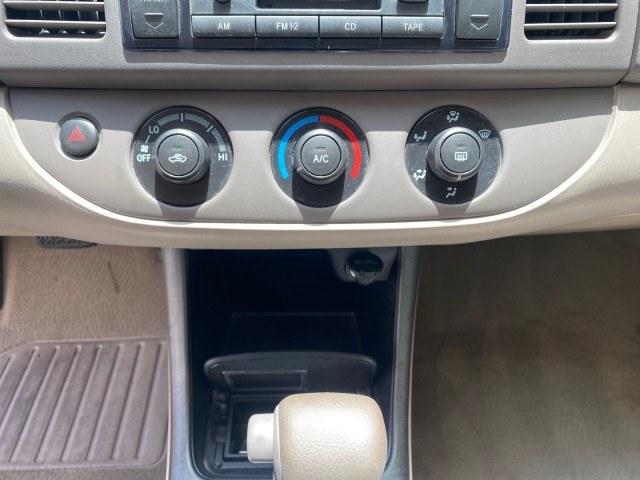 2004 Desert Sand Mica /Stone Toyota Camry LE LOW MILES 58,925 1 OWNER (4T1BE32K04U) with an 2.4L DOHC MPFI Vvti 16-Valve 4-Cyl Engine engine, Automatic transmission, located at 4701 North Dixie Hwy, Pompano Beach, FL, 33064, (954) 422-2889, 26.240938, -80.123474 - OUR WEBPAGE FLORIDACARS1.COM HAS OVER 100 PHOTOS AND FREE CARFAX LINK 2004 Toyota Camry LE 1 OWNER Sedan 4 DR 2.4L I4 F DOHC 16V Gasoline 32 MPG Front Wheel Drive Features Air Conditioning AM/FM Stereo Automatic Transmission Cassette Player CD Audio Cloth Seats Cruise Control Power Locks Power Mirro- Photo#55