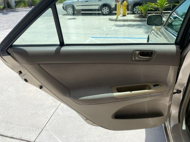 2004 Desert Sand Mica /Stone Toyota Camry LE LOW MILES 58,925 1 OWNER (4T1BE32K04U) with an 2.4L DOHC MPFI Vvti 16-Valve 4-Cyl Engine engine, Automatic transmission, located at 4701 North Dixie Hwy, Pompano Beach, FL, 33064, (954) 422-2889, 26.240938, -80.123474 - OUR WEBPAGE FLORIDACARS1.COM HAS OVER 100 PHOTOS AND FREE CARFAX LINK 2004 Toyota Camry LE 1 OWNER Sedan 4 DR 2.4L I4 F DOHC 16V Gasoline 32 MPG Front Wheel Drive Features Air Conditioning AM/FM Stereo Automatic Transmission Cassette Player CD Audio Cloth Seats Cruise Control Power Locks Power Mirro- Photo#70