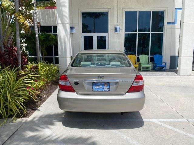 2004 Desert Sand Mica /Stone Toyota Camry LE LOW MILES 58,925 1 OWNER (4T1BE32K04U) with an 2.4L DOHC MPFI Vvti 16-Valve 4-Cyl Engine engine, Automatic transmission, located at 4701 North Dixie Hwy, Pompano Beach, FL, 33064, (954) 422-2889, 26.240938, -80.123474 - OUR WEBPAGE FLORIDACARS1.COM HAS OVER 100 PHOTOS AND FREE CARFAX LINK 2004 Toyota Camry LE 1 OWNER Sedan 4 DR 2.4L I4 F DOHC 16V Gasoline 32 MPG Front Wheel Drive Features Air Conditioning AM/FM Stereo Automatic Transmission Cassette Player CD Audio Cloth Seats Cruise Control Power Locks Power Mirro- Photo#94