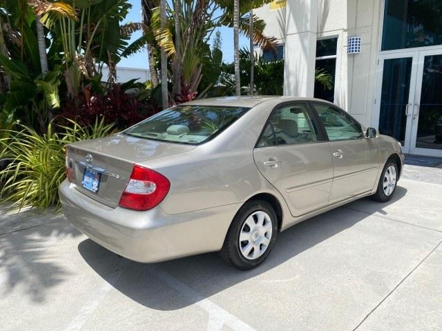 2004 Desert Sand Mica /Stone Toyota Camry LE LOW MILES 58,925 1 OWNER (4T1BE32K04U) with an 2.4L DOHC MPFI Vvti 16-Valve 4-Cyl Engine engine, Automatic transmission, located at 4701 North Dixie Hwy, Pompano Beach, FL, 33064, (954) 422-2889, 26.240938, -80.123474 - OUR WEBPAGE FLORIDACARS1.COM HAS OVER 100 PHOTOS AND FREE CARFAX LINK 2004 Toyota Camry LE 1 OWNER Sedan 4 DR 2.4L I4 F DOHC 16V Gasoline 32 MPG Front Wheel Drive Features Air Conditioning AM/FM Stereo Automatic Transmission Cassette Player CD Audio Cloth Seats Cruise Control Power Locks Power Mirro- Photo#96