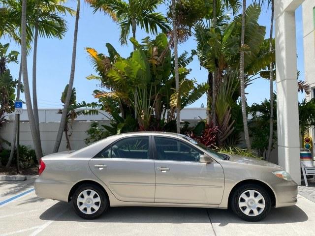 2004 Desert Sand Mica /Stone Toyota Camry LE LOW MILES 58,925 1 OWNER (4T1BE32K04U) with an 2.4L DOHC MPFI Vvti 16-Valve 4-Cyl Engine engine, Automatic transmission, located at 4701 North Dixie Hwy, Pompano Beach, FL, 33064, (954) 422-2889, 26.240938, -80.123474 - OUR WEBPAGE FLORIDACARS1.COM HAS OVER 100 PHOTOS AND FREE CARFAX LINK 2004 Toyota Camry LE 1 OWNER Sedan 4 DR 2.4L I4 F DOHC 16V Gasoline 32 MPG Front Wheel Drive Features Air Conditioning AM/FM Stereo Automatic Transmission Cassette Player CD Audio Cloth Seats Cruise Control Power Locks Power Mirro- Photo#98