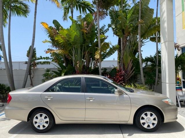 2004 Desert Sand Mica /Stone Toyota Camry LE LOW MILES 58,925 1 OWNER (4T1BE32K04U) with an 2.4L DOHC MPFI Vvti 16-Valve 4-Cyl Engine engine, Automatic transmission, located at 4701 North Dixie Hwy, Pompano Beach, FL, 33064, (954) 422-2889, 26.240938, -80.123474 - OUR WEBPAGE FLORIDACARS1.COM HAS OVER 100 PHOTOS AND FREE CARFAX LINK 2004 Toyota Camry LE 1 OWNER Sedan 4 DR 2.4L I4 F DOHC 16V Gasoline 32 MPG Front Wheel Drive Features Air Conditioning AM/FM Stereo Automatic Transmission Cassette Player CD Audio Cloth Seats Cruise Control Power Locks Power Mirro- Photo#99