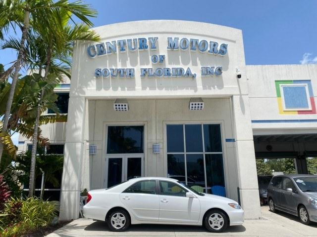 2003 Super White /Stone Toyota Camry LE LOW MILES 61,005 (4T1BF32K63U) with an 3.0L DOHC 24-Valve V6 Engine engine, Automatic transmission, located at 4701 North Dixie Hwy, Pompano Beach, FL, 33064, (954) 422-2889, 26.240938, -80.123474 - OUR WEBPAGE FLORIDACARS1.COM HAS OVER 100 PHOTOS AND FREE CARFAX LINK 2003 Toyota Camry LE Sedan 4 DR 3.0L V6 F DOHC 24V Gasoline 28 MPG Front Wheel Drive Features ABS Brakes Air Conditioning Alloy Wheels AM/FM Stereo Automatic Transmission Cassette Player CD Audio Cloth Seats Cruise Control Power L- Photo#0