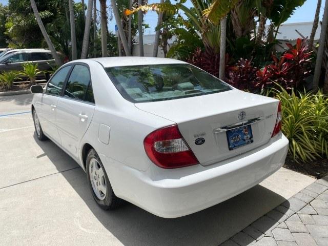 2003 Super White /Stone Toyota Camry LE LOW MILES 61,005 (4T1BF32K63U) with an 3.0L DOHC 24-Valve V6 Engine engine, Automatic transmission, located at 4701 North Dixie Hwy, Pompano Beach, FL, 33064, (954) 422-2889, 26.240938, -80.123474 - OUR WEBPAGE FLORIDACARS1.COM HAS OVER 100 PHOTOS AND FREE CARFAX LINK 2003 Toyota Camry LE Sedan 4 DR 3.0L V6 F DOHC 24V Gasoline 28 MPG Front Wheel Drive Features ABS Brakes Air Conditioning Alloy Wheels AM/FM Stereo Automatic Transmission Cassette Player CD Audio Cloth Seats Cruise Control Power L- Photo#5