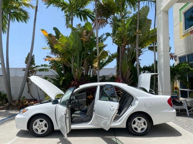2003 Super White /Stone Toyota Camry LE LOW MILES 61,005 (4T1BF32K63U) with an 3.0L DOHC 24-Valve V6 Engine engine, Automatic transmission, located at 4701 North Dixie Hwy, Pompano Beach, FL, 33064, (954) 422-2889, 26.240938, -80.123474 - OUR WEBPAGE FLORIDACARS1.COM HAS OVER 100 PHOTOS AND FREE CARFAX LINK 2003 Toyota Camry LE Sedan 4 DR 3.0L V6 F DOHC 24V Gasoline 28 MPG Front Wheel Drive Features ABS Brakes Air Conditioning Alloy Wheels AM/FM Stereo Automatic Transmission Cassette Player CD Audio Cloth Seats Cruise Control Power L- Photo#8
