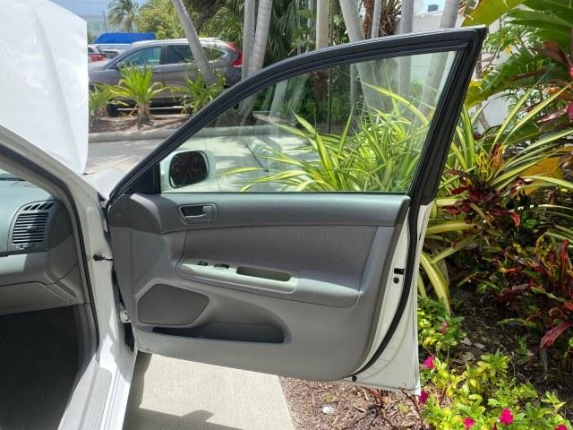 2003 Super White /Stone Toyota Camry LE LOW MILES 61,005 (4T1BF32K63U) with an 3.0L DOHC 24-Valve V6 Engine engine, Automatic transmission, located at 4701 North Dixie Hwy, Pompano Beach, FL, 33064, (954) 422-2889, 26.240938, -80.123474 - OUR WEBPAGE FLORIDACARS1.COM HAS OVER 100 PHOTOS AND FREE CARFAX LINK 2003 Toyota Camry LE Sedan 4 DR 3.0L V6 F DOHC 24V Gasoline 28 MPG Front Wheel Drive Features ABS Brakes Air Conditioning Alloy Wheels AM/FM Stereo Automatic Transmission Cassette Player CD Audio Cloth Seats Cruise Control Power L- Photo#11