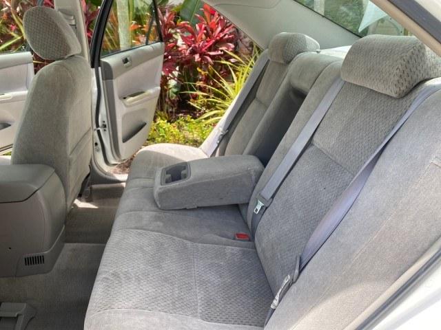 2003 Super White /Stone Toyota Camry LE LOW MILES 61,005 (4T1BF32K63U) with an 3.0L DOHC 24-Valve V6 Engine engine, Automatic transmission, located at 4701 North Dixie Hwy, Pompano Beach, FL, 33064, (954) 422-2889, 26.240938, -80.123474 - OUR WEBPAGE FLORIDACARS1.COM HAS OVER 100 PHOTOS AND FREE CARFAX LINK 2003 Toyota Camry LE Sedan 4 DR 3.0L V6 F DOHC 24V Gasoline 28 MPG Front Wheel Drive Features ABS Brakes Air Conditioning Alloy Wheels AM/FM Stereo Automatic Transmission Cassette Player CD Audio Cloth Seats Cruise Control Power L- Photo#14