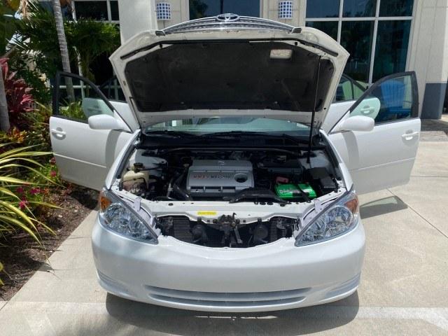 2003 Super White /Stone Toyota Camry LE LOW MILES 61,005 (4T1BF32K63U) with an 3.0L DOHC 24-Valve V6 Engine engine, Automatic transmission, located at 4701 North Dixie Hwy, Pompano Beach, FL, 33064, (954) 422-2889, 26.240938, -80.123474 - OUR WEBPAGE FLORIDACARS1.COM HAS OVER 100 PHOTOS AND FREE CARFAX LINK 2003 Toyota Camry LE Sedan 4 DR 3.0L V6 F DOHC 24V Gasoline 28 MPG Front Wheel Drive Features ABS Brakes Air Conditioning Alloy Wheels AM/FM Stereo Automatic Transmission Cassette Player CD Audio Cloth Seats Cruise Control Power L- Photo#17