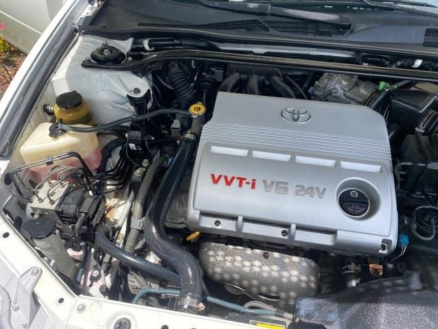 2003 Super White /Stone Toyota Camry LE LOW MILES 61,005 (4T1BF32K63U) with an 3.0L DOHC 24-Valve V6 Engine engine, Automatic transmission, located at 4701 North Dixie Hwy, Pompano Beach, FL, 33064, (954) 422-2889, 26.240938, -80.123474 - OUR WEBPAGE FLORIDACARS1.COM HAS OVER 100 PHOTOS AND FREE CARFAX LINK 2003 Toyota Camry LE Sedan 4 DR 3.0L V6 F DOHC 24V Gasoline 28 MPG Front Wheel Drive Features ABS Brakes Air Conditioning Alloy Wheels AM/FM Stereo Automatic Transmission Cassette Player CD Audio Cloth Seats Cruise Control Power L- Photo#24