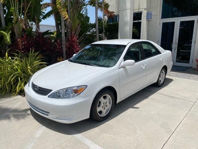 2003 Super White /Stone Toyota Camry LE LOW MILES 61,005 (4T1BF32K63U) with an 3.0L DOHC 24-Valve V6 Engine engine, Automatic transmission, located at 4701 North Dixie Hwy, Pompano Beach, FL, 33064, (954) 422-2889, 26.240938, -80.123474 - OUR WEBPAGE FLORIDACARS1.COM HAS OVER 100 PHOTOS AND FREE CARFAX LINK 2003 Toyota Camry LE Sedan 4 DR 3.0L V6 F DOHC 24V Gasoline 28 MPG Front Wheel Drive Features ABS Brakes Air Conditioning Alloy Wheels AM/FM Stereo Automatic Transmission Cassette Player CD Audio Cloth Seats Cruise Control Power L- Photo#28