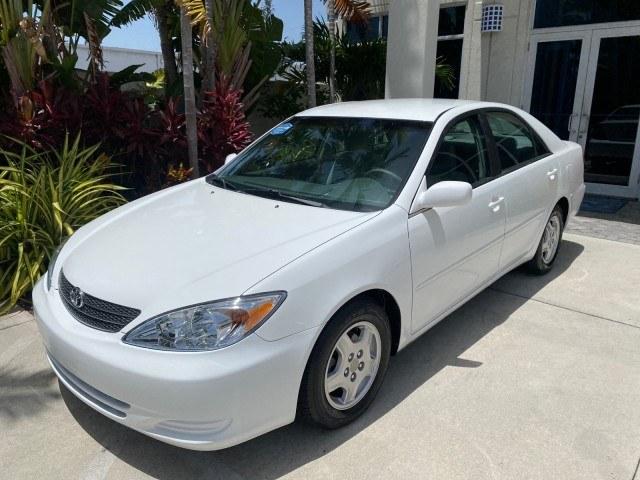 2003 Super White /Stone Toyota Camry LE LOW MILES 61,005 (4T1BF32K63U) with an 3.0L DOHC 24-Valve V6 Engine engine, Automatic transmission, located at 4701 North Dixie Hwy, Pompano Beach, FL, 33064, (954) 422-2889, 26.240938, -80.123474 - OUR WEBPAGE FLORIDACARS1.COM HAS OVER 100 PHOTOS AND FREE CARFAX LINK 2003 Toyota Camry LE Sedan 4 DR 3.0L V6 F DOHC 24V Gasoline 28 MPG Front Wheel Drive Features ABS Brakes Air Conditioning Alloy Wheels AM/FM Stereo Automatic Transmission Cassette Player CD Audio Cloth Seats Cruise Control Power L- Photo#29