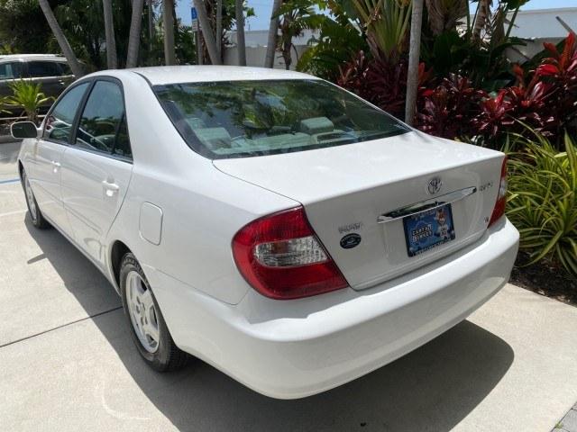2003 Super White /Stone Toyota Camry LE LOW MILES 61,005 (4T1BF32K63U) with an 3.0L DOHC 24-Valve V6 Engine engine, Automatic transmission, located at 4701 North Dixie Hwy, Pompano Beach, FL, 33064, (954) 422-2889, 26.240938, -80.123474 - OUR WEBPAGE FLORIDACARS1.COM HAS OVER 100 PHOTOS AND FREE CARFAX LINK 2003 Toyota Camry LE Sedan 4 DR 3.0L V6 F DOHC 24V Gasoline 28 MPG Front Wheel Drive Features ABS Brakes Air Conditioning Alloy Wheels AM/FM Stereo Automatic Transmission Cassette Player CD Audio Cloth Seats Cruise Control Power L- Photo#33