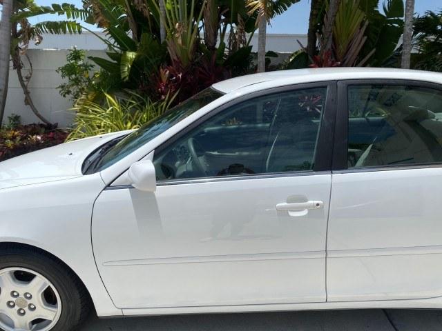 2003 Super White /Stone Toyota Camry LE LOW MILES 61,005 (4T1BF32K63U) with an 3.0L DOHC 24-Valve V6 Engine engine, Automatic transmission, located at 4701 North Dixie Hwy, Pompano Beach, FL, 33064, (954) 422-2889, 26.240938, -80.123474 - OUR WEBPAGE FLORIDACARS1.COM HAS OVER 100 PHOTOS AND FREE CARFAX LINK 2003 Toyota Camry LE Sedan 4 DR 3.0L V6 F DOHC 24V Gasoline 28 MPG Front Wheel Drive Features ABS Brakes Air Conditioning Alloy Wheels AM/FM Stereo Automatic Transmission Cassette Player CD Audio Cloth Seats Cruise Control Power L- Photo#36