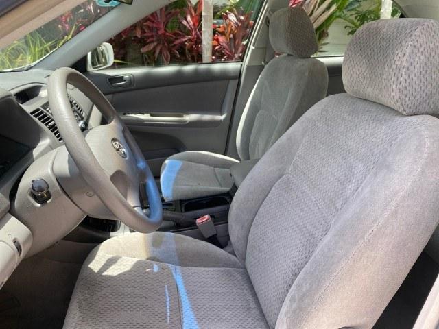 2003 Super White /Stone Toyota Camry LE LOW MILES 61,005 (4T1BF32K63U) with an 3.0L DOHC 24-Valve V6 Engine engine, Automatic transmission, located at 4701 North Dixie Hwy, Pompano Beach, FL, 33064, (954) 422-2889, 26.240938, -80.123474 - OUR WEBPAGE FLORIDACARS1.COM HAS OVER 100 PHOTOS AND FREE CARFAX LINK 2003 Toyota Camry LE Sedan 4 DR 3.0L V6 F DOHC 24V Gasoline 28 MPG Front Wheel Drive Features ABS Brakes Air Conditioning Alloy Wheels AM/FM Stereo Automatic Transmission Cassette Player CD Audio Cloth Seats Cruise Control Power L- Photo#41