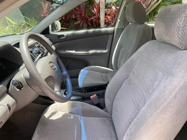 2003 Super White /Stone Toyota Camry LE LOW MILES 61,005 (4T1BF32K63U) with an 3.0L DOHC 24-Valve V6 Engine engine, Automatic transmission, located at 4701 North Dixie Hwy, Pompano Beach, FL, 33064, (954) 422-2889, 26.240938, -80.123474 - OUR WEBPAGE FLORIDACARS1.COM HAS OVER 100 PHOTOS AND FREE CARFAX LINK 2003 Toyota Camry LE Sedan 4 DR 3.0L V6 F DOHC 24V Gasoline 28 MPG Front Wheel Drive Features ABS Brakes Air Conditioning Alloy Wheels AM/FM Stereo Automatic Transmission Cassette Player CD Audio Cloth Seats Cruise Control Power L- Photo#42