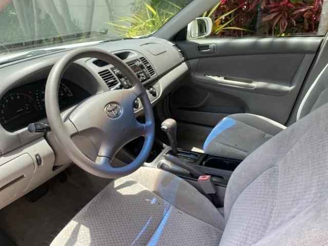 2003 Super White /Stone Toyota Camry LE LOW MILES 61,005 (4T1BF32K63U) with an 3.0L DOHC 24-Valve V6 Engine engine, Automatic transmission, located at 4701 North Dixie Hwy, Pompano Beach, FL, 33064, (954) 422-2889, 26.240938, -80.123474 - OUR WEBPAGE FLORIDACARS1.COM HAS OVER 100 PHOTOS AND FREE CARFAX LINK 2003 Toyota Camry LE Sedan 4 DR 3.0L V6 F DOHC 24V Gasoline 28 MPG Front Wheel Drive Features ABS Brakes Air Conditioning Alloy Wheels AM/FM Stereo Automatic Transmission Cassette Player CD Audio Cloth Seats Cruise Control Power L- Photo#44