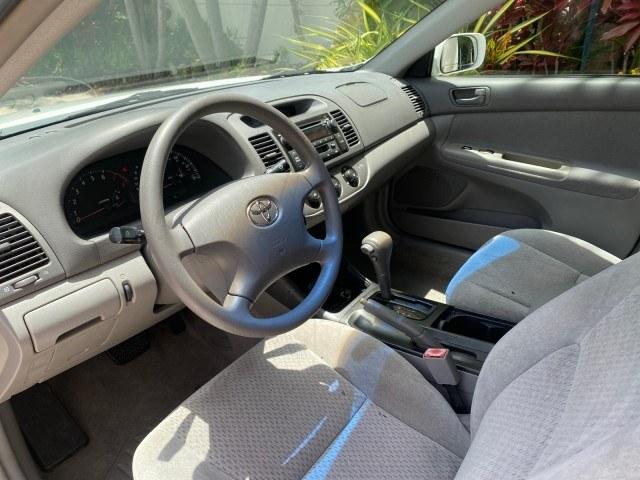2003 Super White /Stone Toyota Camry LE LOW MILES 61,005 (4T1BF32K63U) with an 3.0L DOHC 24-Valve V6 Engine engine, Automatic transmission, located at 4701 North Dixie Hwy, Pompano Beach, FL, 33064, (954) 422-2889, 26.240938, -80.123474 - OUR WEBPAGE FLORIDACARS1.COM HAS OVER 100 PHOTOS AND FREE CARFAX LINK 2003 Toyota Camry LE Sedan 4 DR 3.0L V6 F DOHC 24V Gasoline 28 MPG Front Wheel Drive Features ABS Brakes Air Conditioning Alloy Wheels AM/FM Stereo Automatic Transmission Cassette Player CD Audio Cloth Seats Cruise Control Power L- Photo#45
