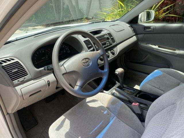 2003 Super White /Stone Toyota Camry LE LOW MILES 61,005 (4T1BF32K63U) with an 3.0L DOHC 24-Valve V6 Engine engine, Automatic transmission, located at 4701 North Dixie Hwy, Pompano Beach, FL, 33064, (954) 422-2889, 26.240938, -80.123474 - OUR WEBPAGE FLORIDACARS1.COM HAS OVER 100 PHOTOS AND FREE CARFAX LINK 2003 Toyota Camry LE Sedan 4 DR 3.0L V6 F DOHC 24V Gasoline 28 MPG Front Wheel Drive Features ABS Brakes Air Conditioning Alloy Wheels AM/FM Stereo Automatic Transmission Cassette Player CD Audio Cloth Seats Cruise Control Power L- Photo#46